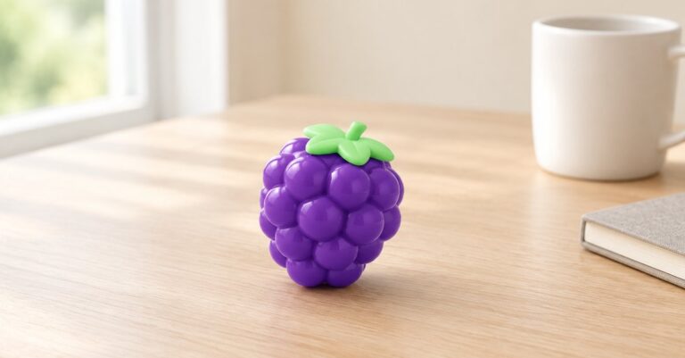 Grape squeeze cube, a quiet low-stimulation fidget for migraine - King Squishy